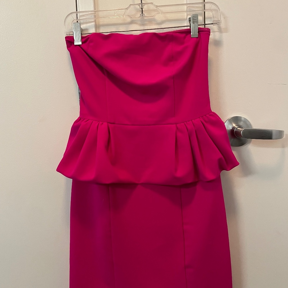 Hot pink strapless peplum cocktail dress
